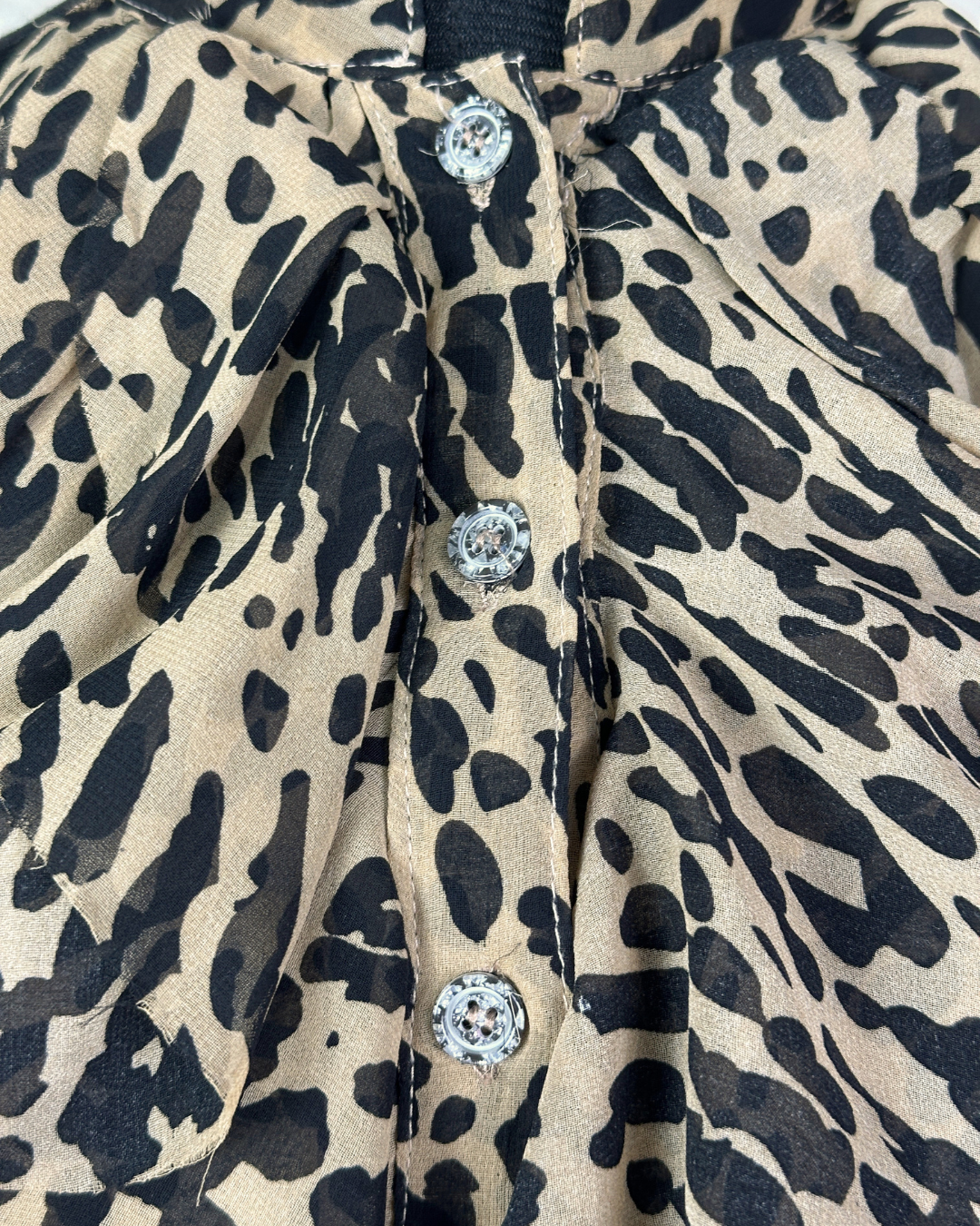 Sleeveless Leopard Print Ruffle Blouse