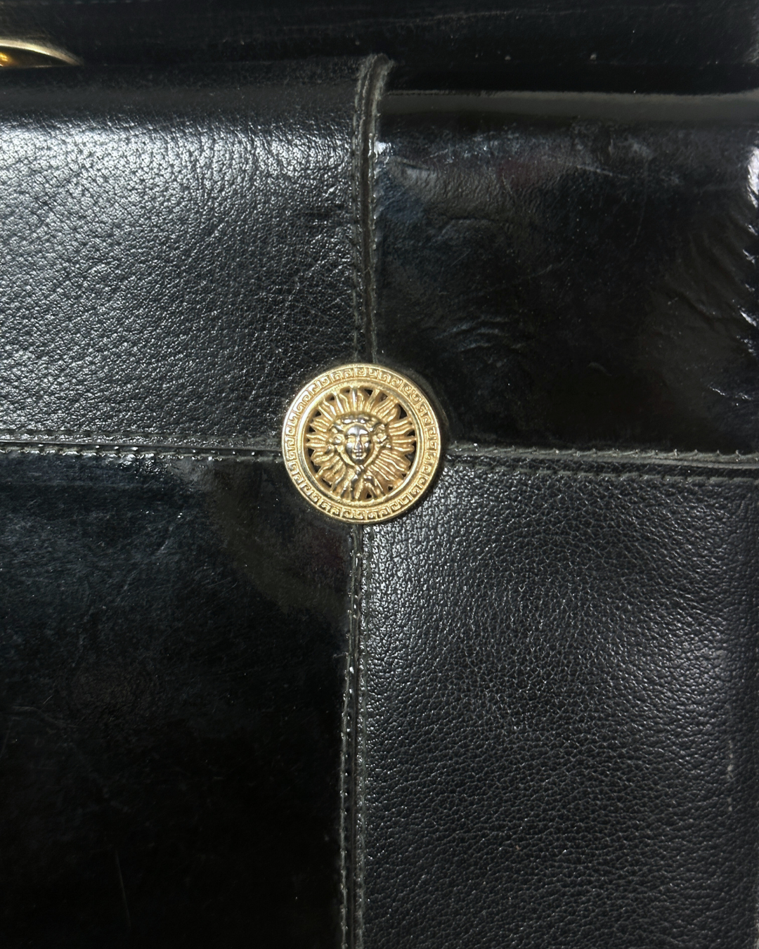 Vintage 80s Leather Structured Handbag with Gold Medallion Details