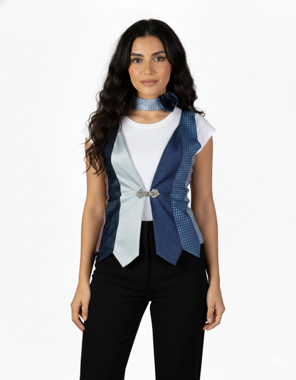 Woman wearing a sleeveless vest with a unique design on a white background