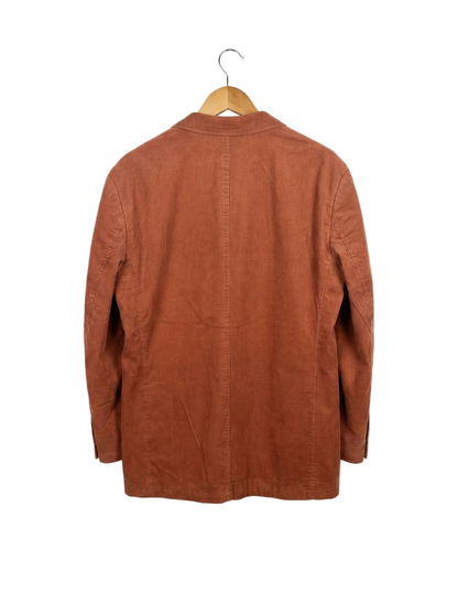 Brown jacket on a hanger against a white background