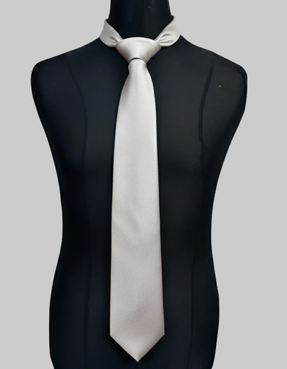 White tie on a black mannequin against a white background