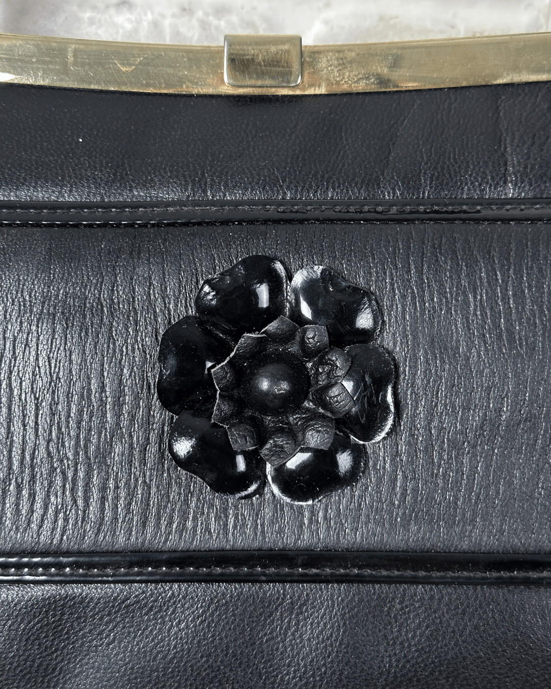 Vintage 1970s Genuine Leather Shoulder Bag with Floral Accent & Brass Frame - Funkify