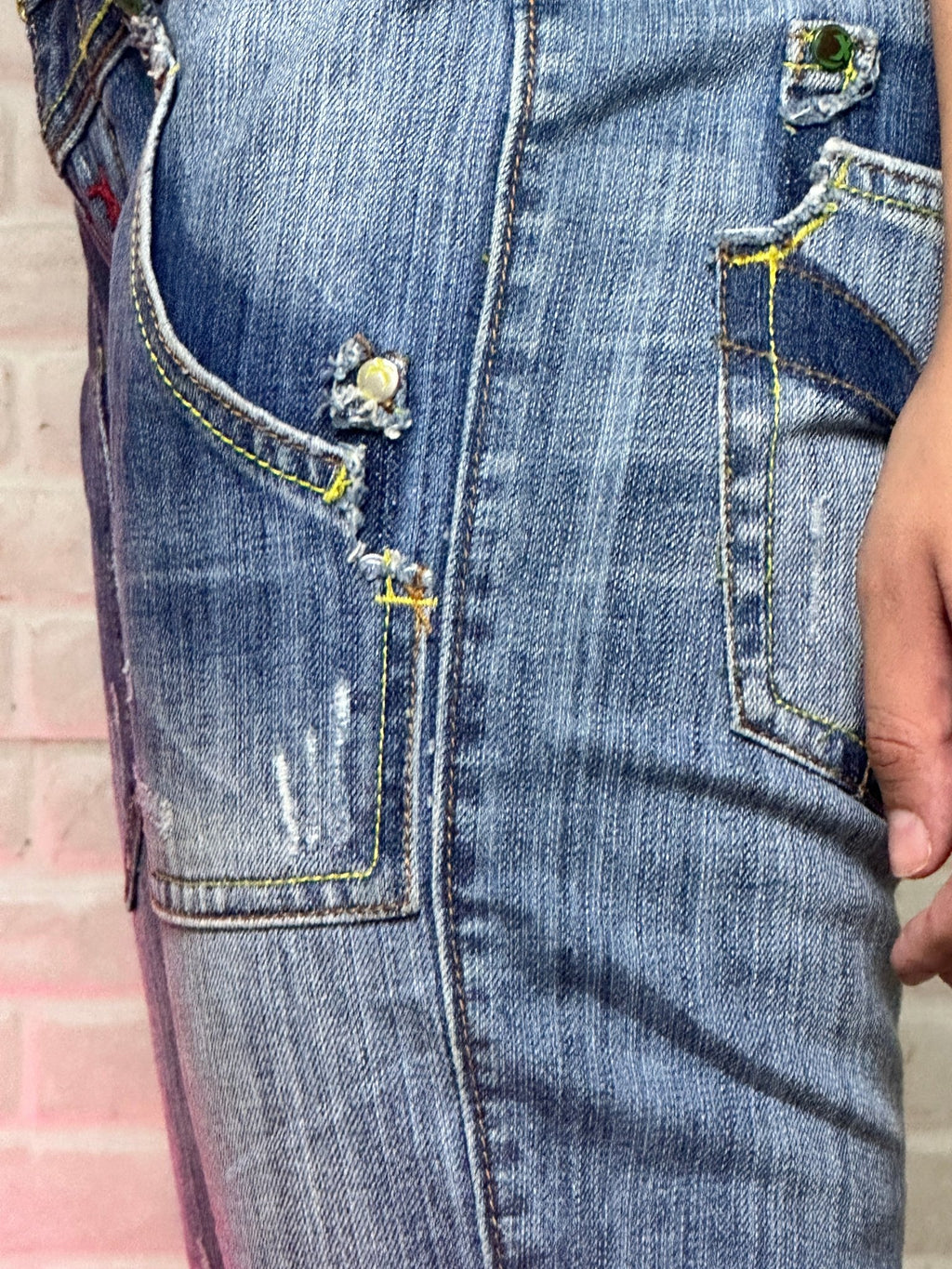 Low waist women's denim jeans with button detailing