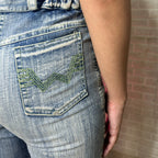 Vintage women's jeans with embroidery detailing, size small