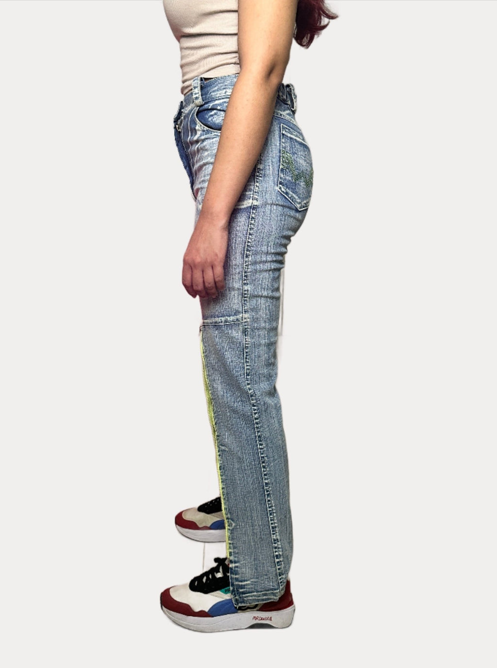 Vintage women's jeans with embroidery detailing, size small